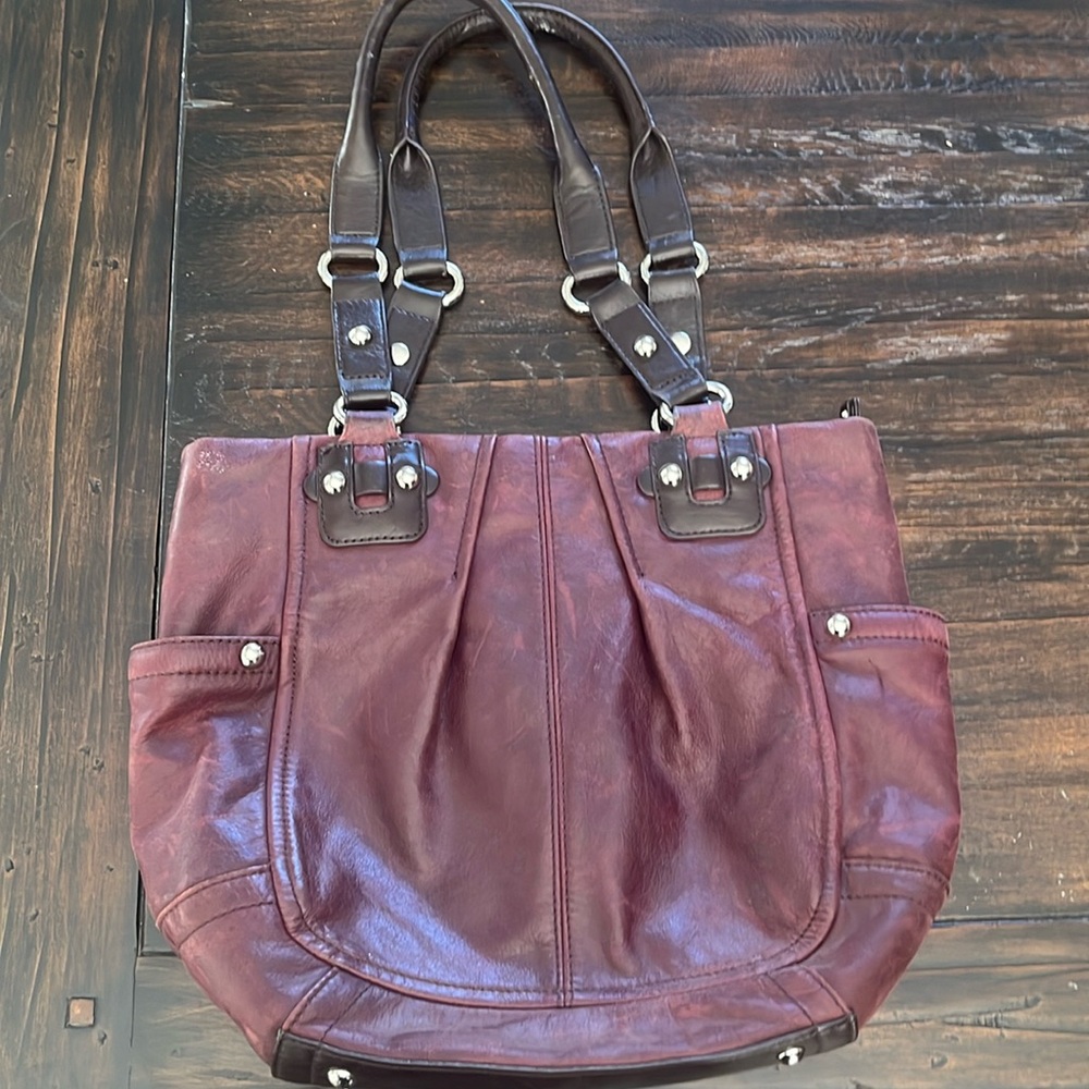 Tignanello leather purse- raisin color with dark brown accent,silver hardware